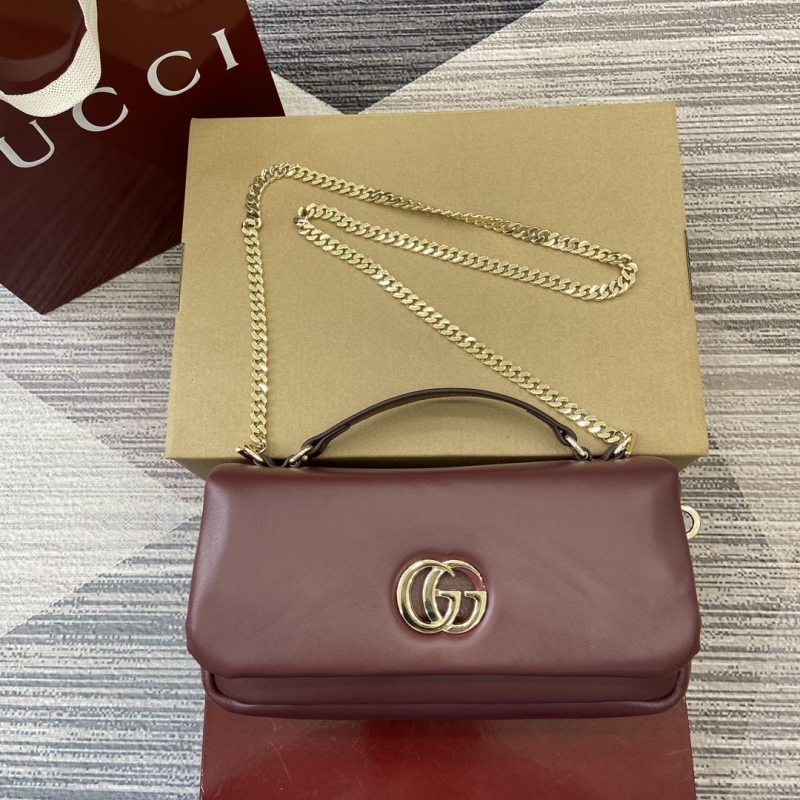 G*u*i top handle bags